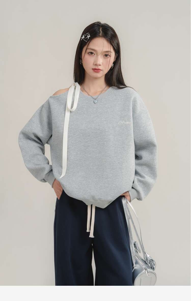 リボンアクセント付きスウェットトップス｜デート服