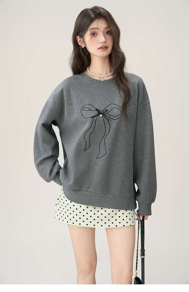 リボン柄オーバーサイズスウェット｜デート服