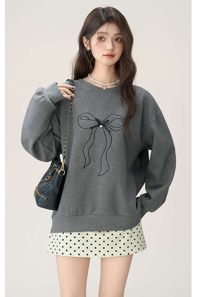 リボン柄オーバーサイズスウェット｜デート服