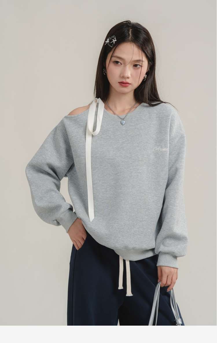 リボンアクセント付きスウェットトップス｜デート服